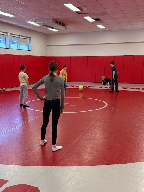 students play gaga ball in the wrestling room