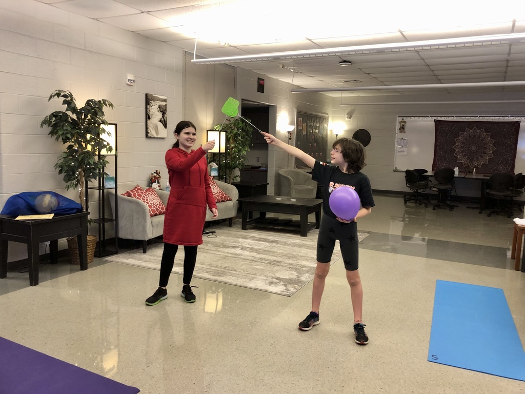 Teamwork makes a game of indoor tennis so much for fun.