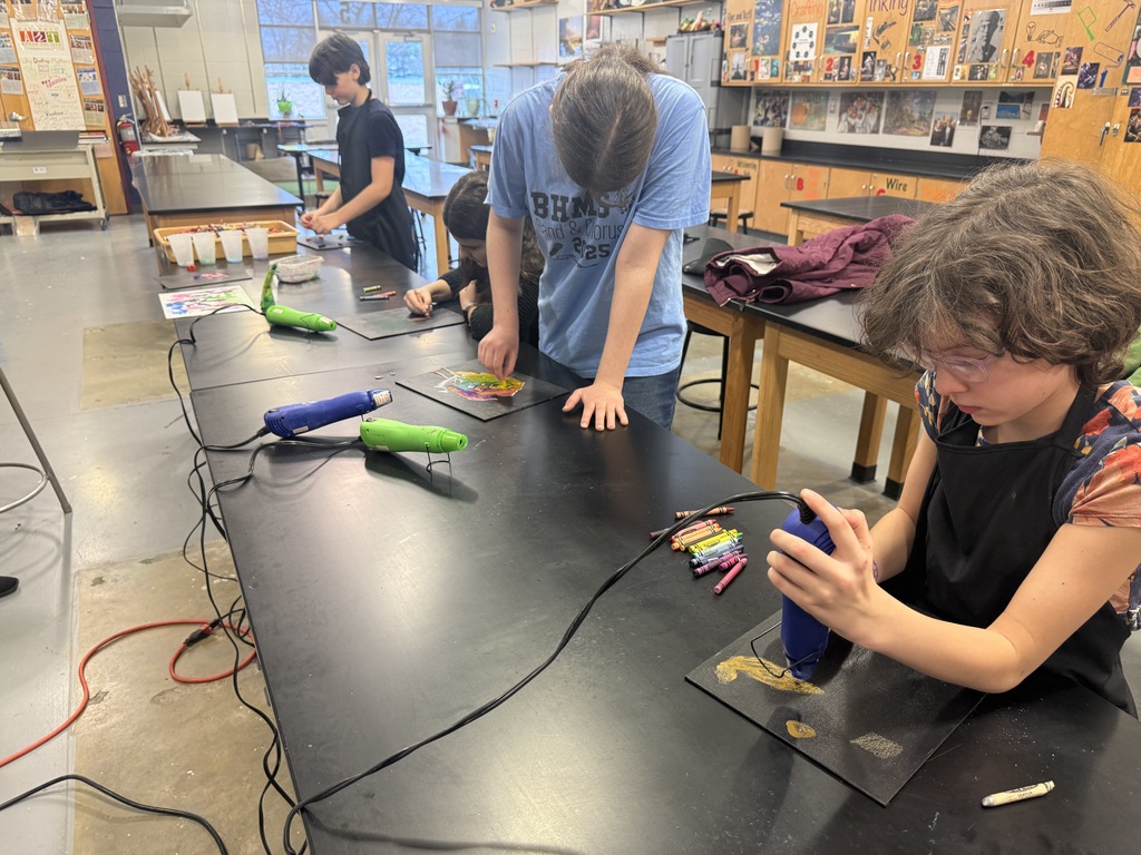 Students experimenting with color and texture.