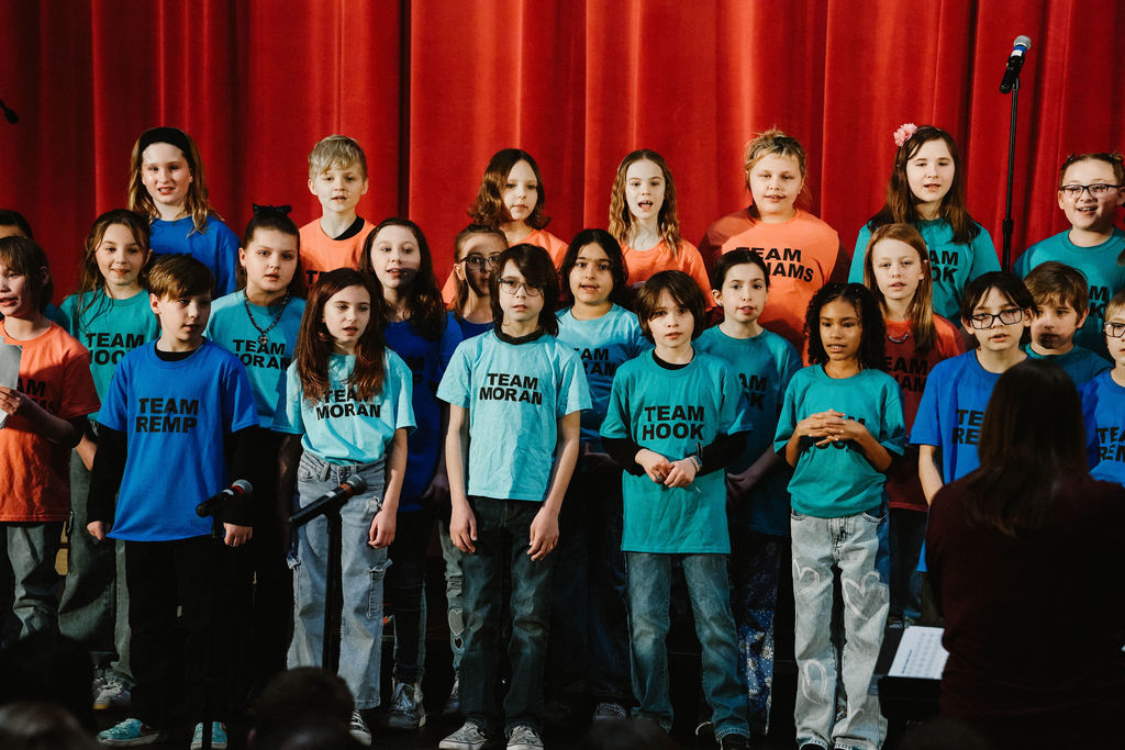 Intermediate School Chorus performing at MIOS