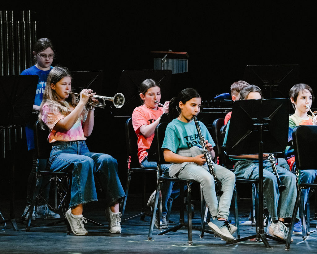 Intermediate School Band performing at MIOS