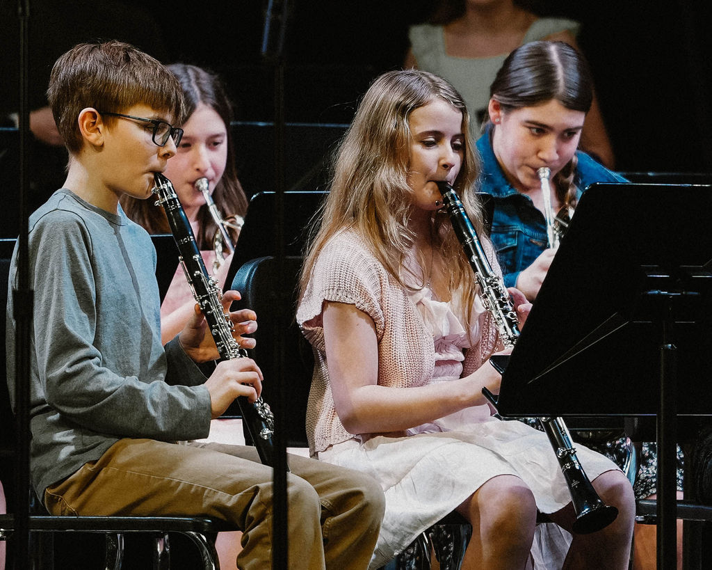 Students playing in band at MIOS