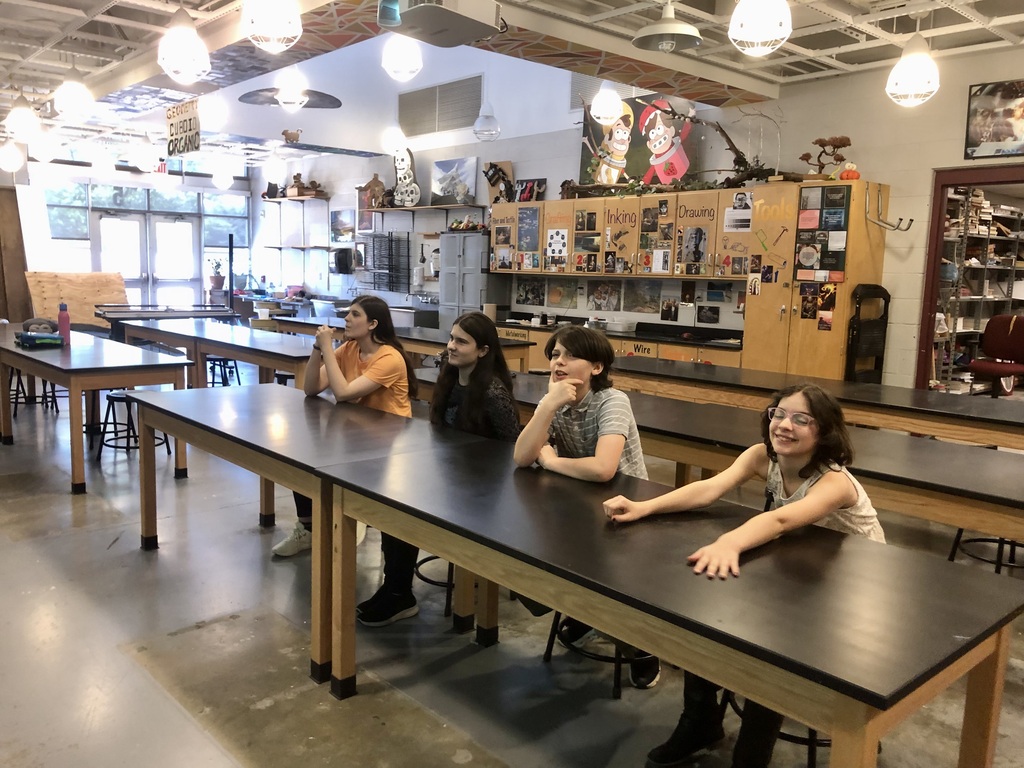 Students gathering for their final art lesson of the school year.