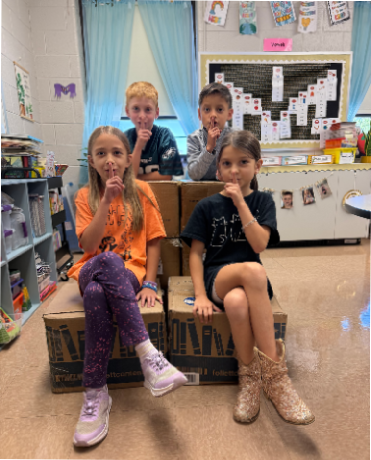 Students expressing a quiet face, representing the book title. 