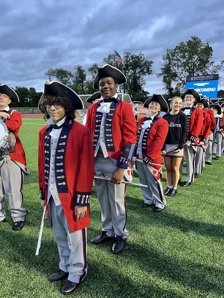 Marching Band students standing before their performance