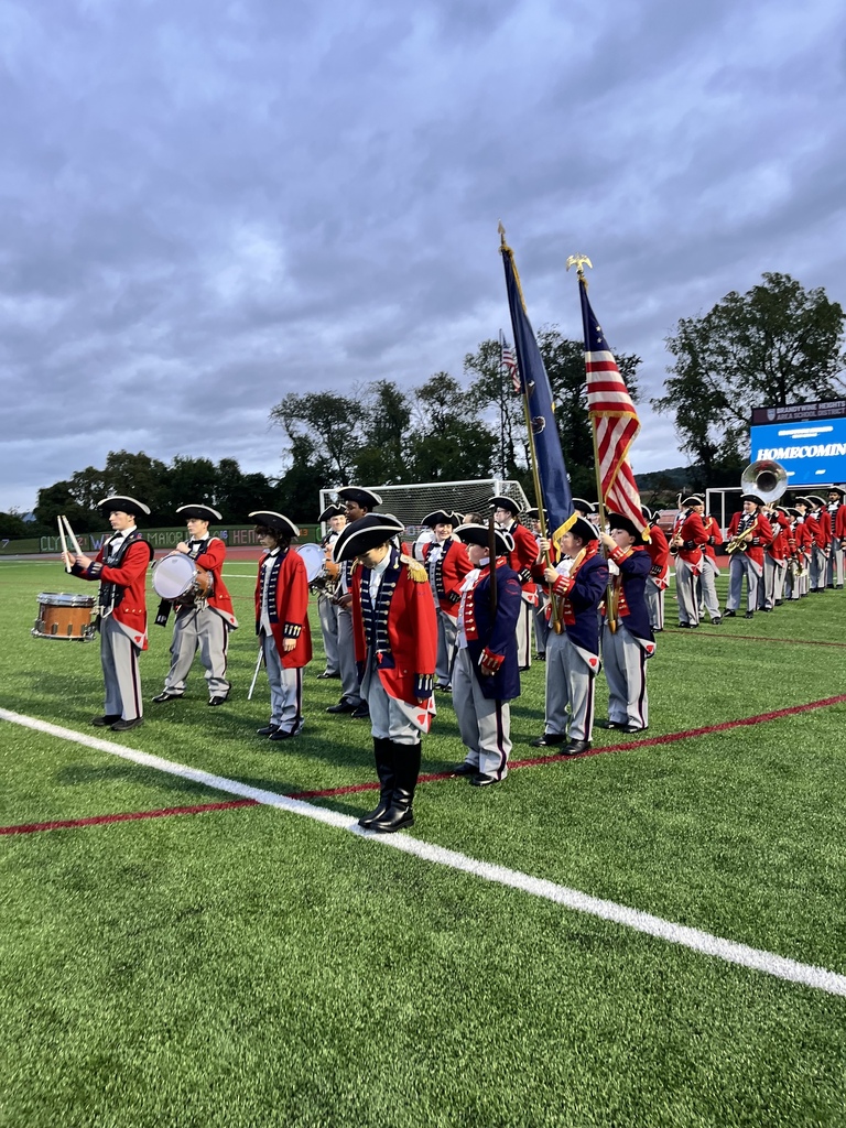 Marching Band students standing on the field