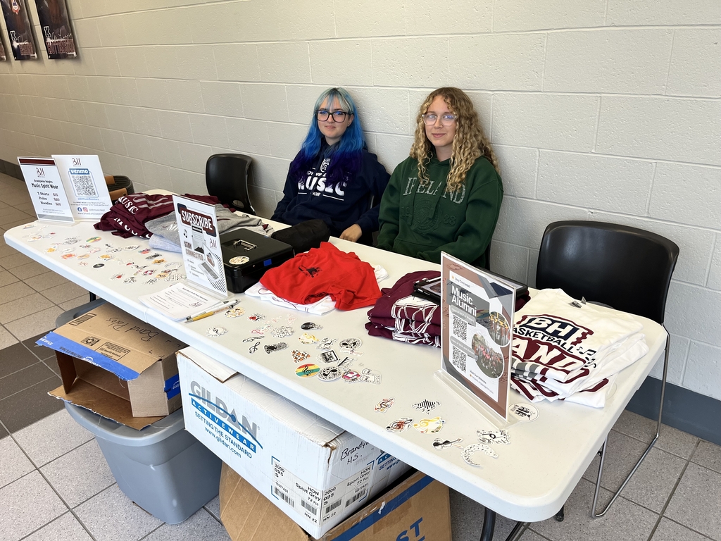 Music students sitting at the music table