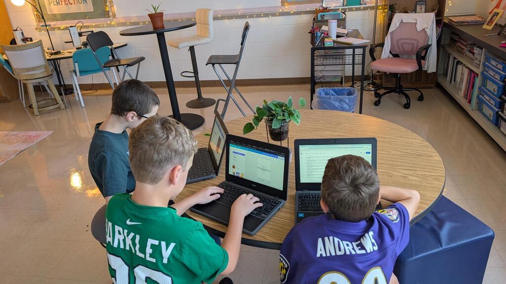 Students work on native plant posters