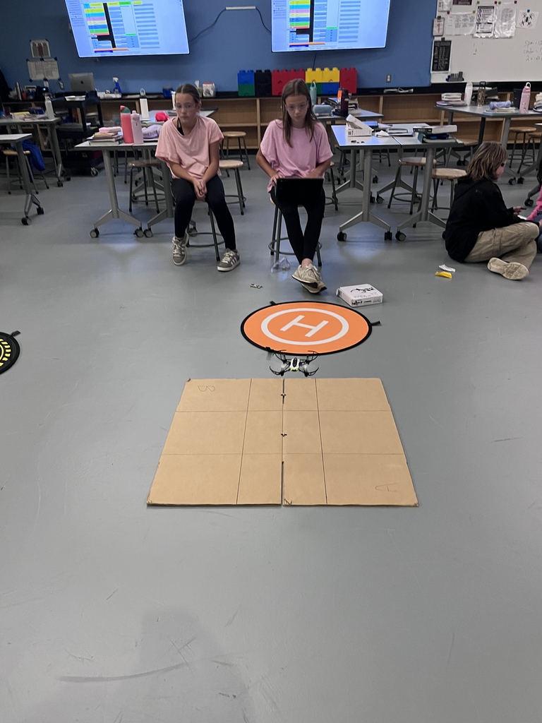 Students play tic-tac-toe with drones
