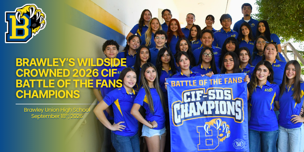 Student hold up CF-SDS Champion Banner. Text staes: Brawley’s Wildside Crowned 2026 CIF Battle of the Fans Champions