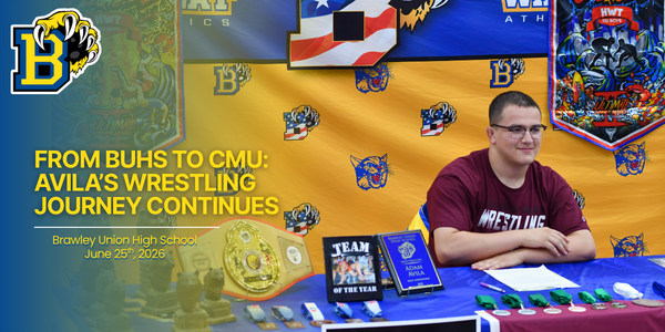 Adam Avila sits at table with several wrestling trophies and medals. Image on text states: From BUHS to CMU Avila’s Wrestling Journey Continues