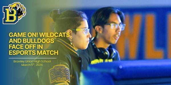 Two students facing screen. Text reads: Game On! Wildcats and Bulldogs  Face Off in  Esports Match