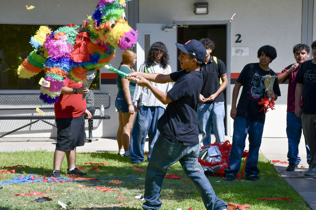 Student hits a pinata