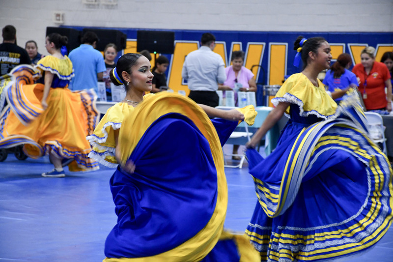 BUHS Folklorio students dance in front of crowd