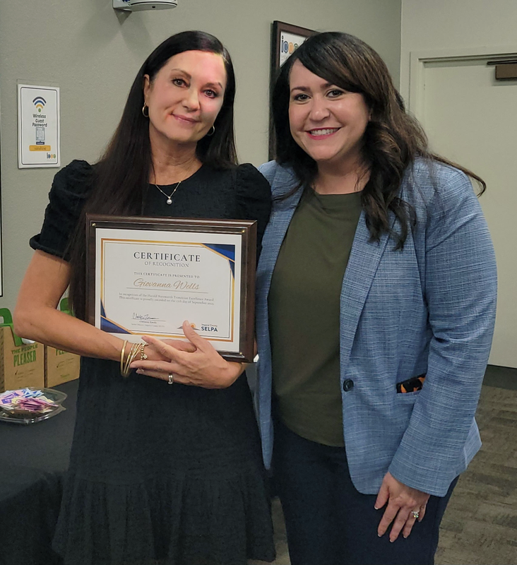 Teacher Giovanna Wells poses for photo with  Director of Education Dr. Fernadez-Kierns