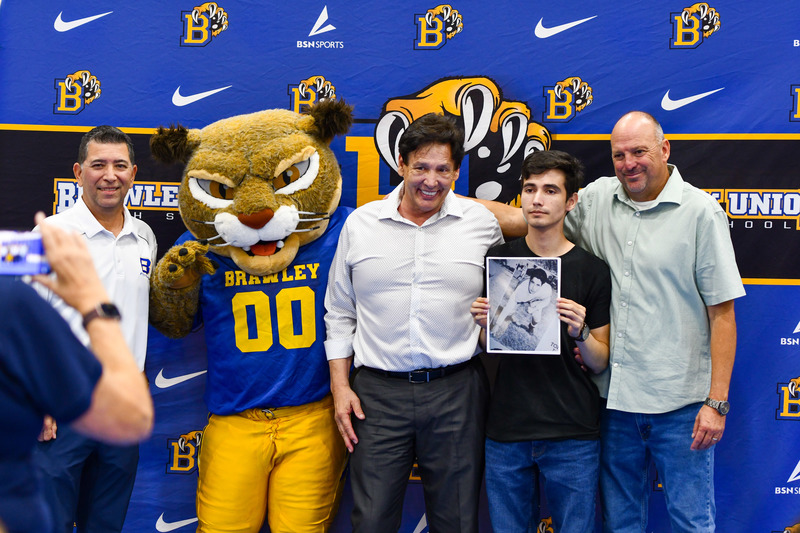 group poses for picture at brawley hall of fame