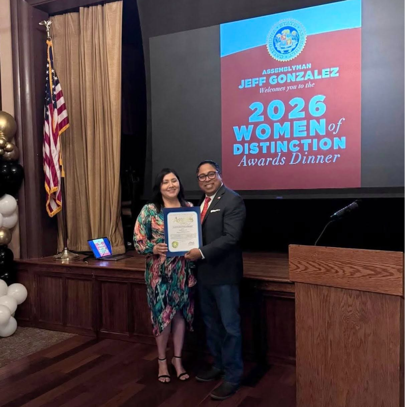 Dalia poses with Assemblymen Jeff