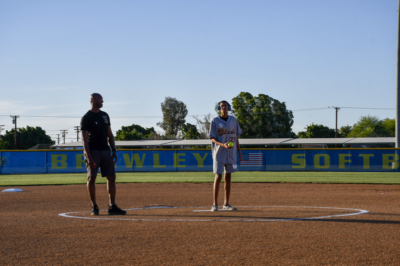 Samaria stands at pitchers circle prepraring to throw the pitch.