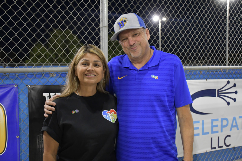 Board Memeber Galvan stands next to Athletic Director Billy Brewer.