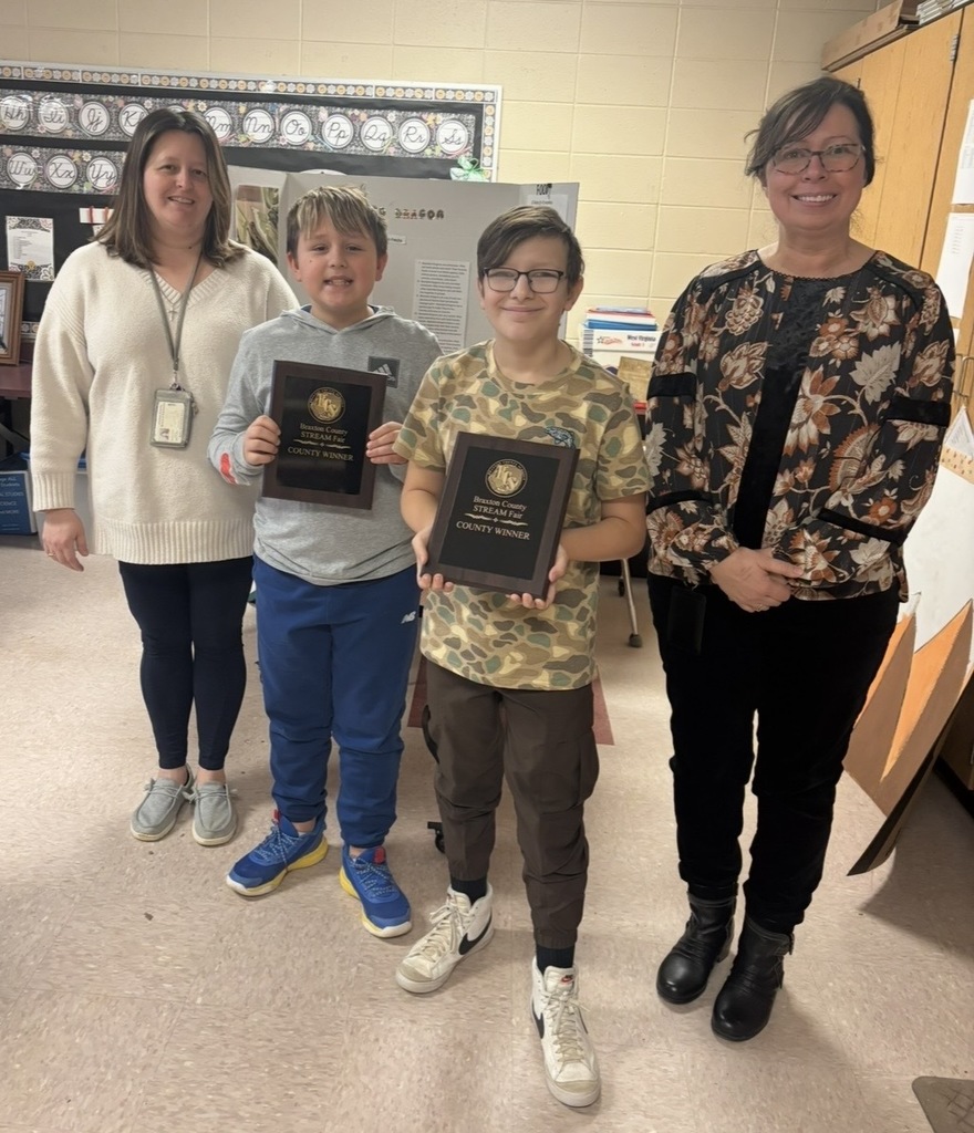 Flatwoods Elementary winners. Pictured L to R are: Sue Ann White, 5th grade teacher, Benley Berry and  Jhett Jackson individual winners, and Meredith Hoover, principal.