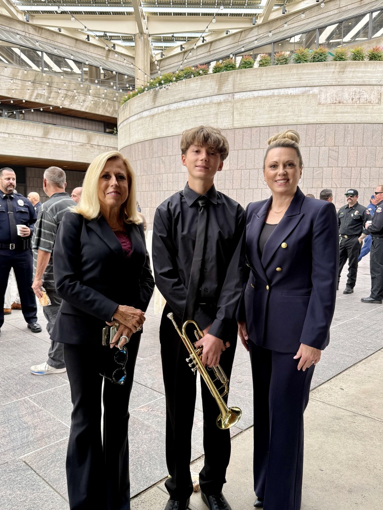 Mayor Cecilia Hupp, BOHS student Max and Superintendent Brinda Leon stand together for a photo