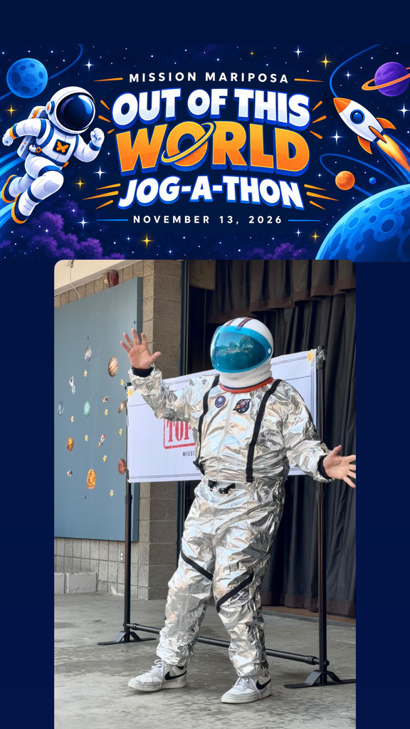 picture of Dr. Torres dressed in a space suite with sign that says out of this world jog a thon 11/13/2026