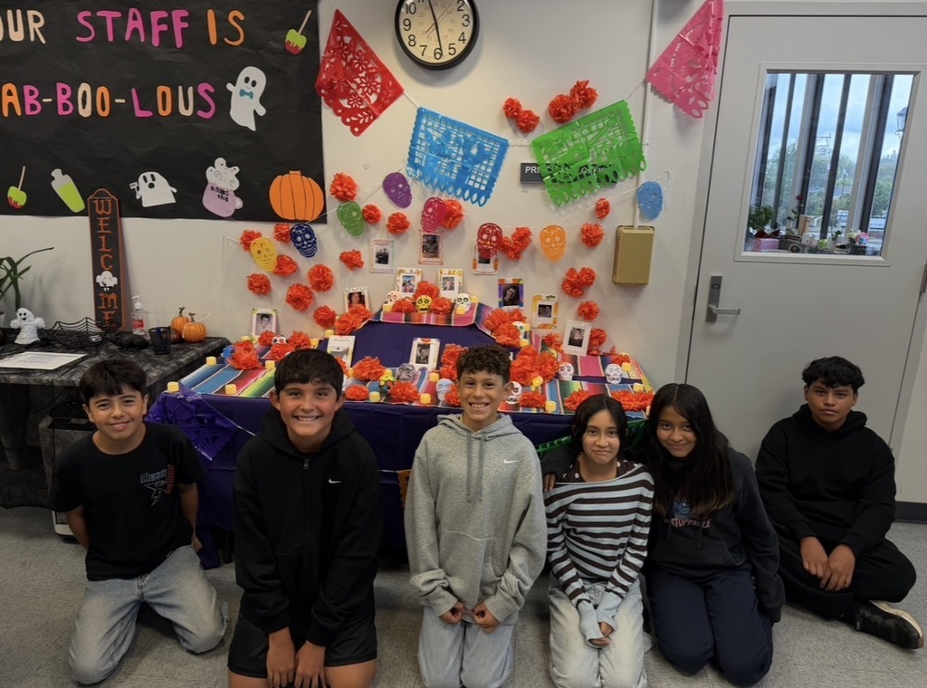 Brea Junior High Dual Language Program students decorate an ofrenda