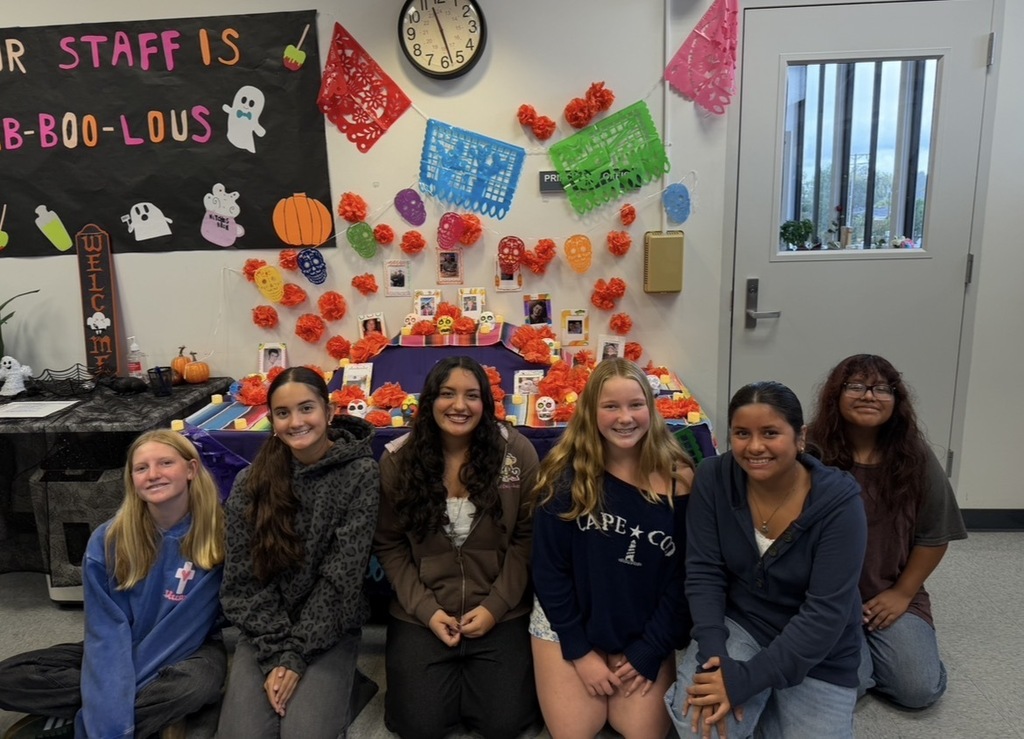 Brea Junior High Dual Language Program students decorate an ofrenda