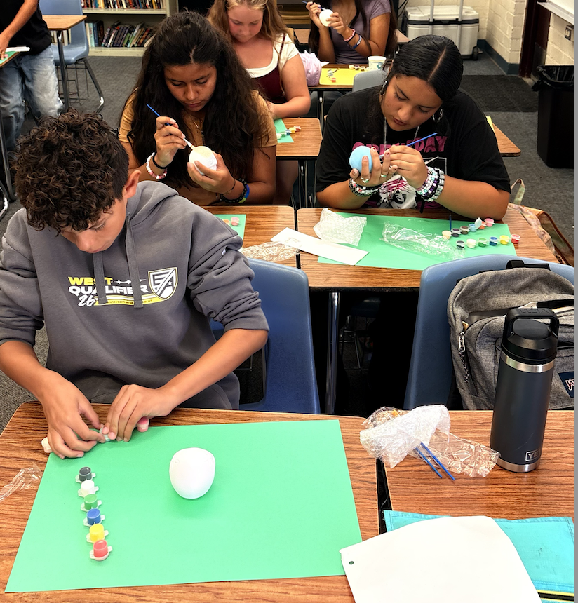 Brea Junior High Dual Language Program students decorate calaveras