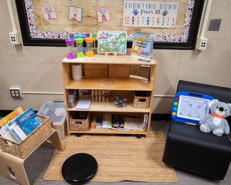 neutral bookcase with other children's furniture showing the mini wellspace