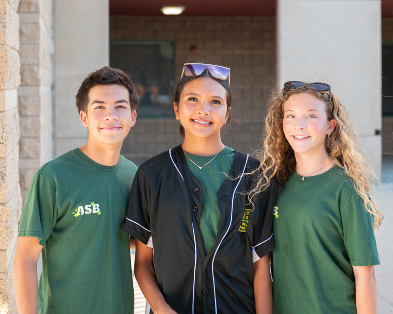 students with green ASB shirts
