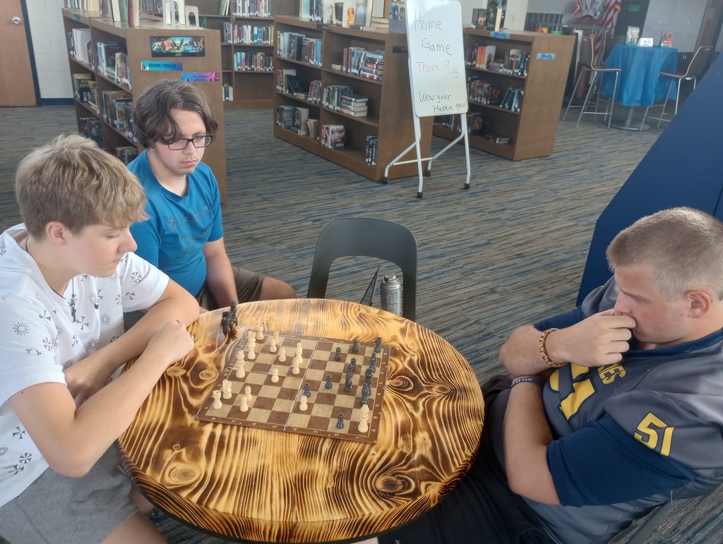 Students playing chess
