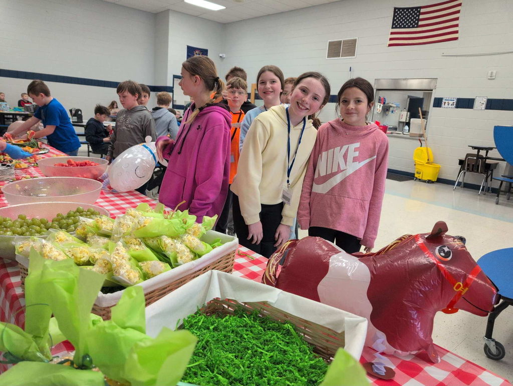 5th graders enjoying their fruit