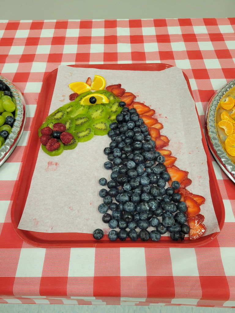 a horse made of fruit 