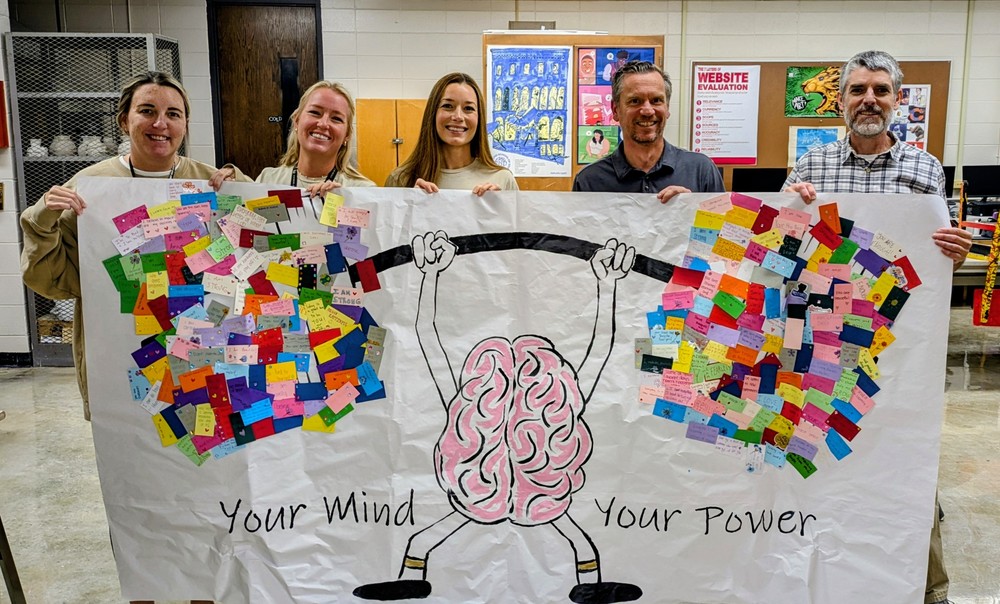 Your Mind Your Power sign with teachers