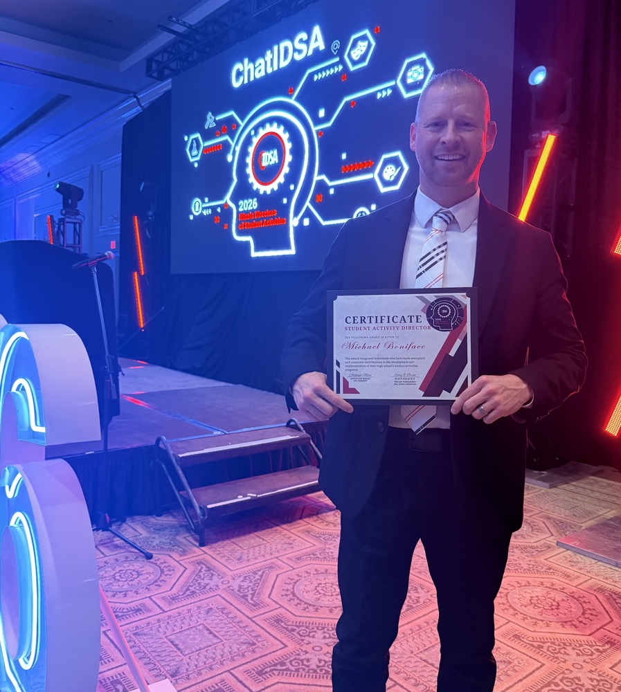 Dr. Michael Boniface poses for a photo after receiving is Award