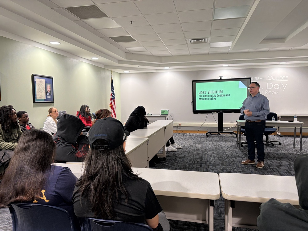 Jose Villarruel, president of JV Design and Manufacturing, shares his story with Delta Academy students during a Hispanic Heritage Month presentation at South Suburban College.
