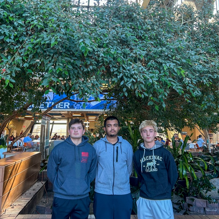 Three students posing