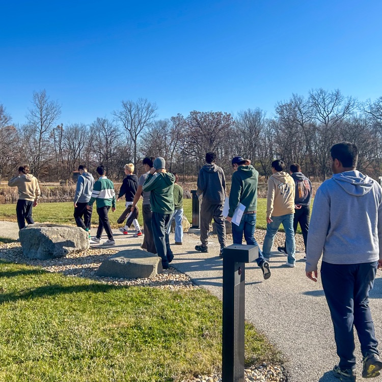A group of highschool students walkongwalking around