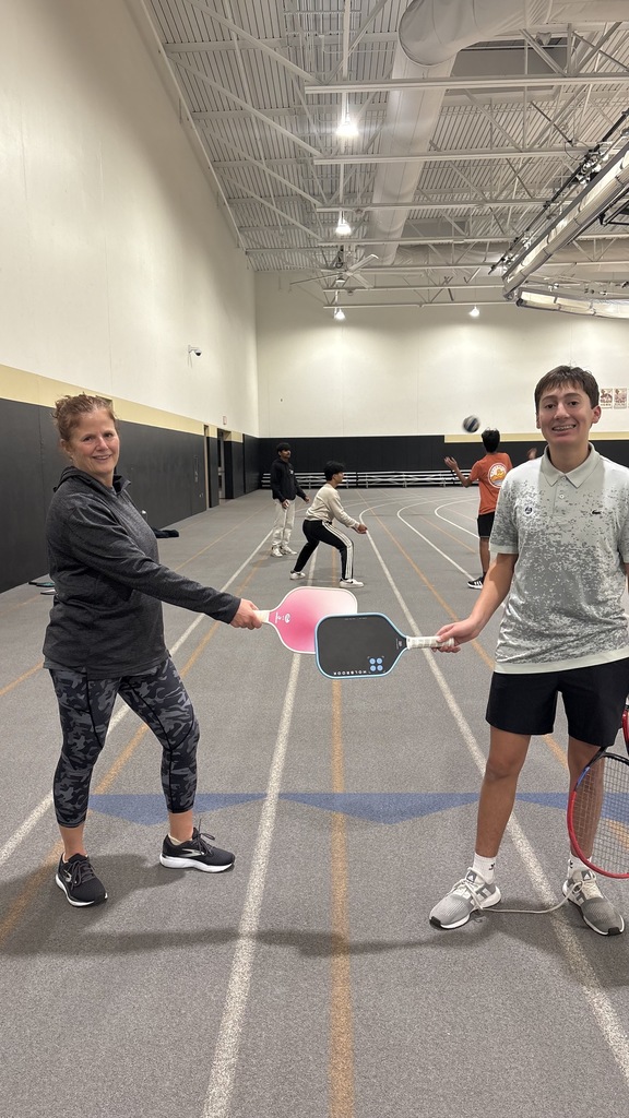 A women and a man standing