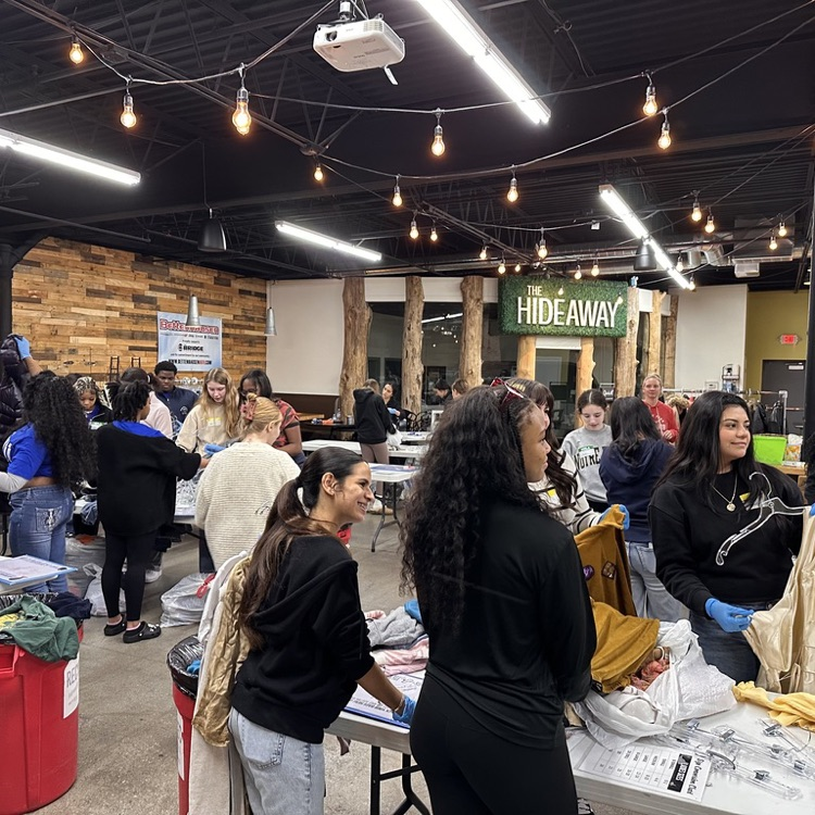 OFHS Junior Class sorting clothes