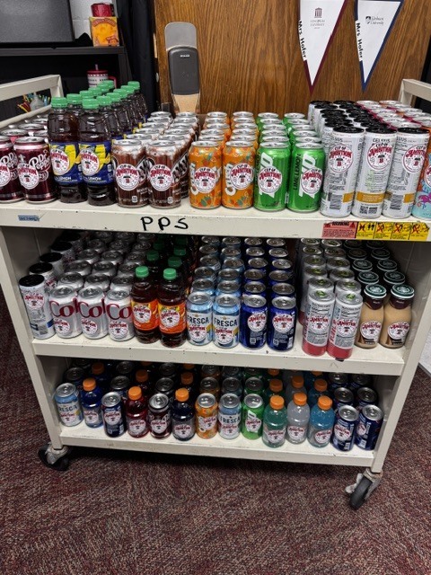 Bremen staff members smile while receiving their favorite beverages as a “Cup of Ambition” in celebration of Dolly Parton Day. The thoughtful pick-me-up recognizes the time, energy, and heart they pour into students each day.