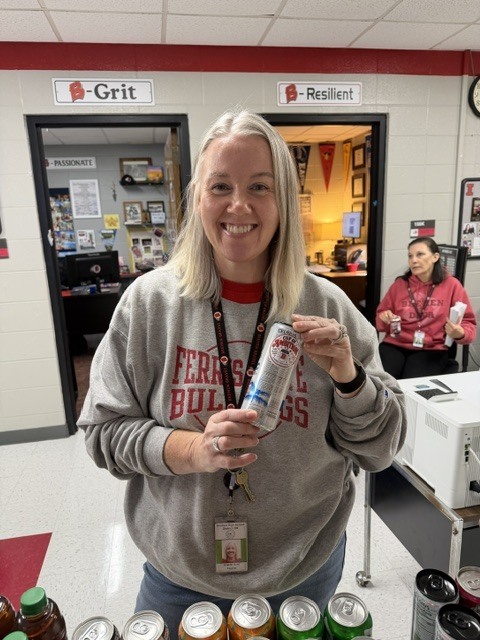 Bremen staff members smile while receiving their favorite beverages as a “Cup of Ambition” in celebration of Dolly Parton Day. The thoughtful pick-me-up recognizes the time, energy, and heart they pour into students each day.