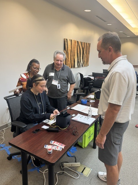OFHS senior students helping with early voting
