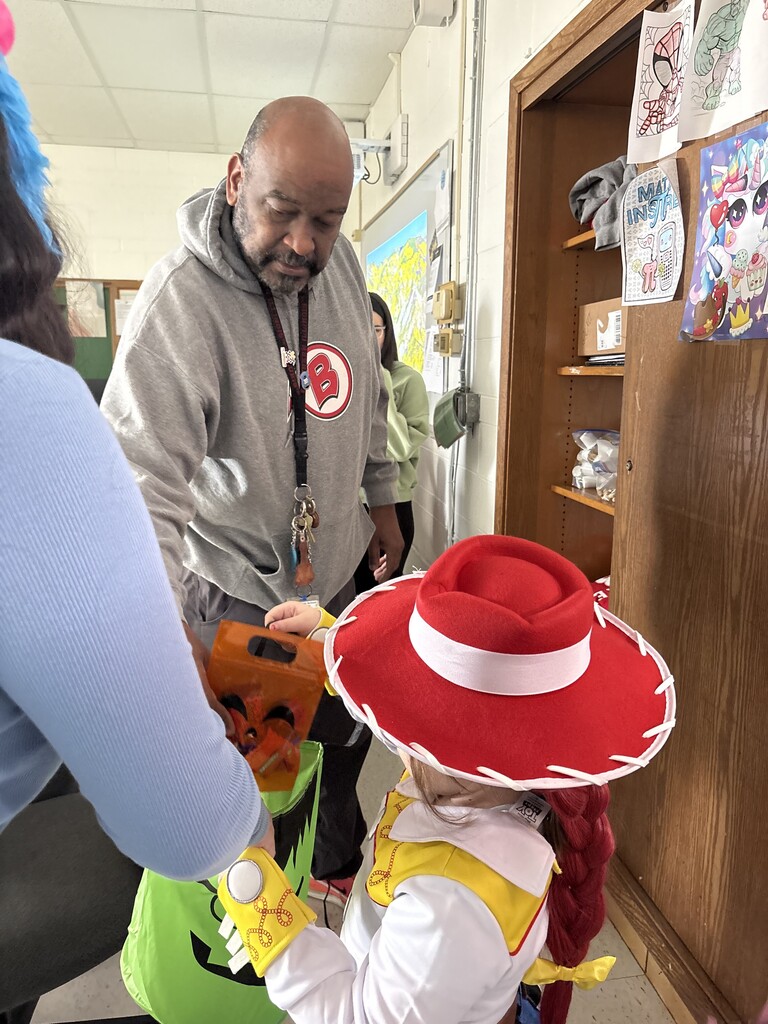 Childcare II students accompany their preschoolers during Bremen High School’s Halloween parade and trick-or-treating event.