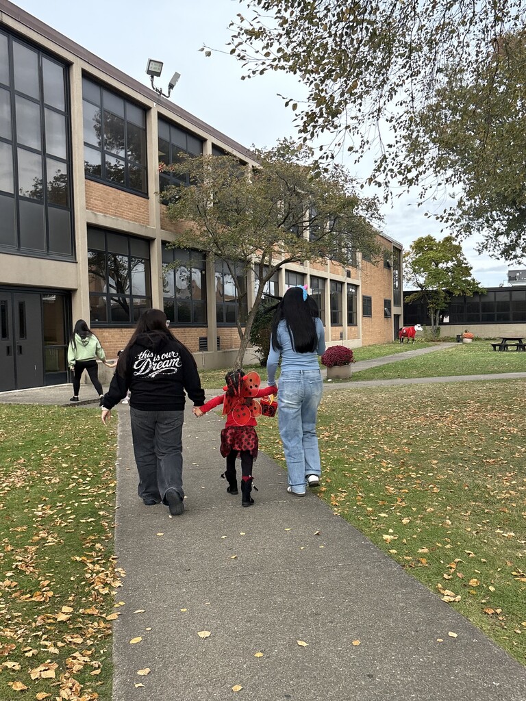 Childcare II students accompany their preschoolers during Bremen High School’s Halloween parade and trick-or-treating event.