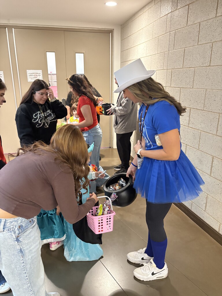 Childcare II students accompany their preschoolers during Bremen High School’s Halloween parade and trick-or-treating event.