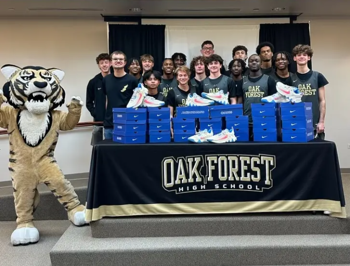 OFHS varsity basketball team with Robbie Availa