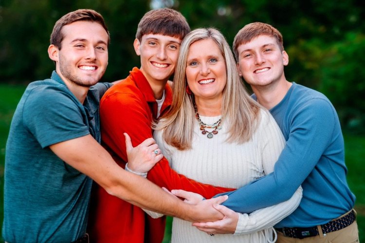 woman and 3 boys 