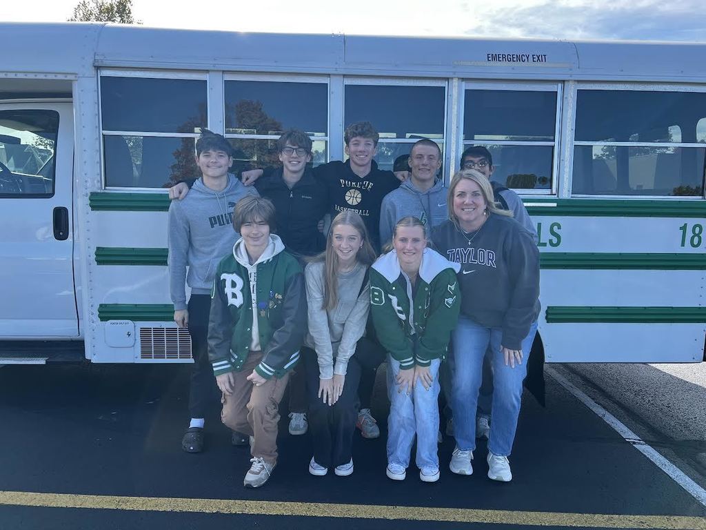 Deca in front of bus